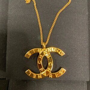 SOLD   CHANEL Metal CC Paris Button Necklace - adjustable